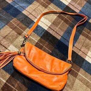 Vibrant Orange Crossbody Bag with Tassel